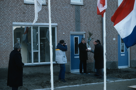  Feestelijke oplevering van een nieuwe woning in de wijk de Poorten.