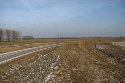  De Rondweg ter hoogte van de Weiden of Velden.