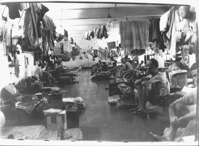 A mens' ward in the cloister-turned-hospital Mater Dolorosa in Batavia. Photo by H. Ripassa, September-October 1945.&lt;br/&gt;NIOD 57290 &lt;a class=uline href=http://www.beeldbankwo2.nl target=_blank&gt;Beeldbank WO2&lt;/a&gt;