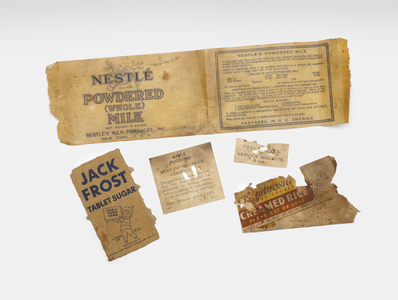 Contents of a Red Cross food package, received in Tjideng Camp in 1944.&lt;br/&gt;NIOD Collectie 417-246g